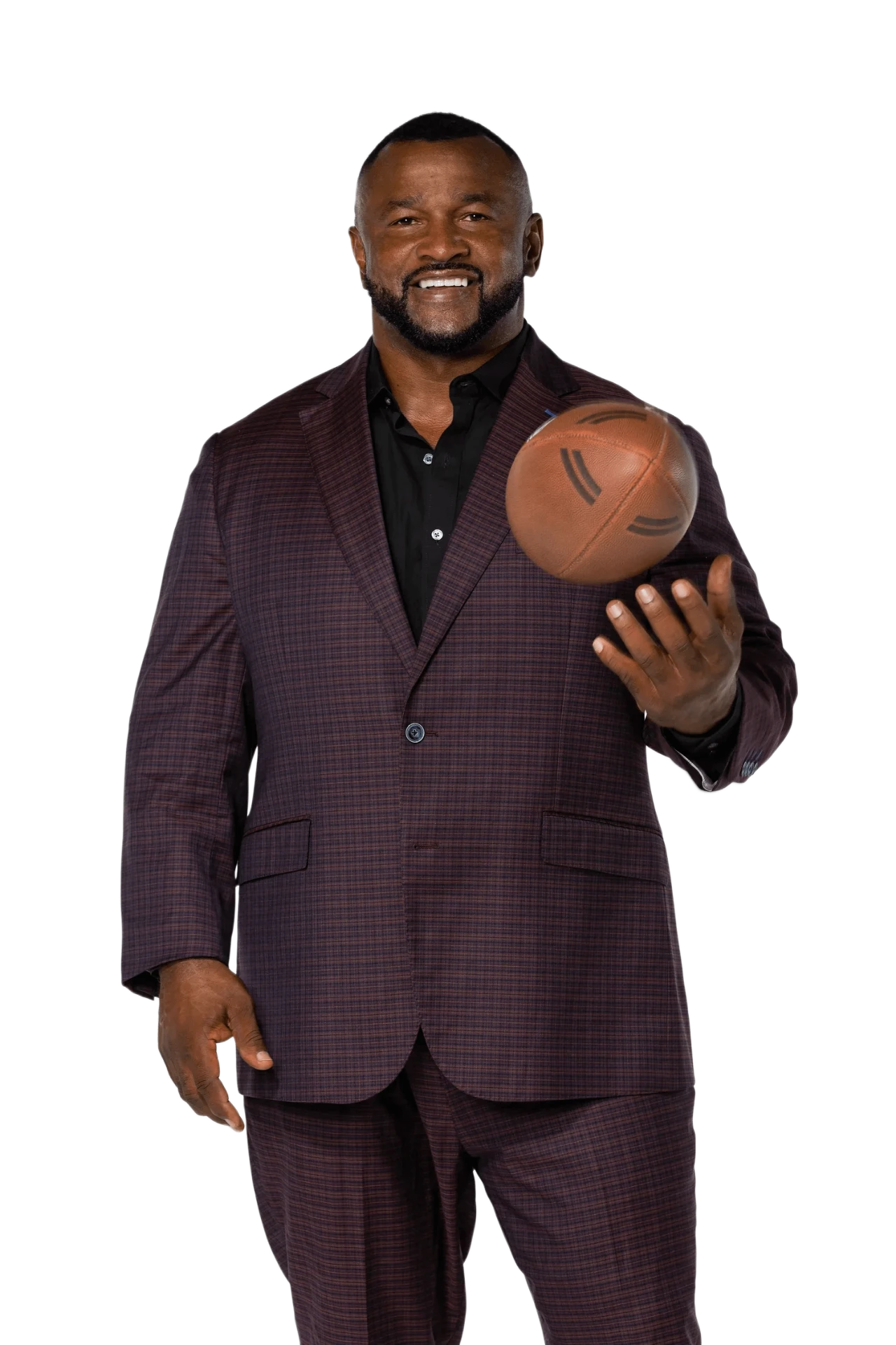 Lorenzo Neal tossing a football